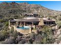 Stunning home with a private pool, covered patio, and incredible mountain views at 42572 N 108Th St, Scottsdale, AZ 85262