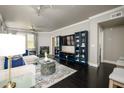 Well-lit living room with modern entertainment center and sophisticated decor at 19777 N 76Th St # 3229, Scottsdale, AZ 85255