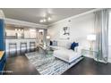 Open-concept living space with bar seating and stylish decor throughout at 19777 N 76Th St # 3229, Scottsdale, AZ 85255