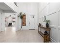A bright entryway features decorative wall trim and tile flooring at 21341 S 227Th Way, Queen Creek, AZ 85142