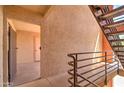 View of the apartment building stairwell at 1340 N Recker Rd # 224, Mesa, AZ 85205