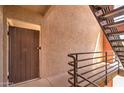 View of the apartment building stairwell at 1340 N Recker Rd # 224, Mesa, AZ 85205