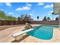 Backyard with a refreshing pool, diving board, and ample space for outdoor enjoyment at 625 S Daley --, Mesa, AZ 85204