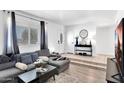 Cozy living room with a comfortable sectional sofa and stylish decor at 625 S Daley --, Mesa, AZ 85204