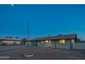 Quaint single-story home with a front yard; an inviting residence with classic curb appeal at 10713 E Oasis Dr, Mesa, AZ 85208