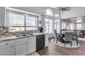 Eat-in kitchen featuring a breakfast nook, updated appliances, and ample counter space at 1266 S Harrington St, Gilbert, AZ 85233