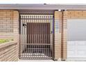 Secured front entrance showcasing a gated entryway and a cozy welcome at 2619 S Los Altos --, Mesa, AZ 85202