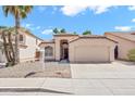 Charming single-story home with a well-manicured front yard and a two-car garage at 4811 W Oakland St, Chandler, AZ 85226