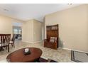 Neutral room with views of dining space, and access to other areas of the house at 10583 S 175Th Ave, Goodyear, AZ 85338