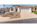 Charming home with desert landscaping, and a two-car garage, with easy street access at 1226 E Presidio Rd, Phoenix, AZ 85022