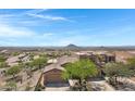 Stunning single-Gathering home with desert landscaping and mountain views at 15025 E Scarlet Sky Ln # 1, Fountain Hills, AZ 85268
