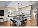 Spacious eat-in kitchen with a large center island and updated appliances at 29227 N 44Th St, Cave Creek, AZ 85331