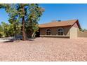 Lovely single-story home with arched windows and low-maintenance landscaping in front at 3124 W Taro Ln, Phoenix, AZ 85027
