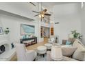 Bright living room with a fireplace, high ceilings, and stylish decor at 4618 E Valley View Dr, Phoenix, AZ 85044