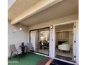 Charming outdoor patio with comfortable seating and sliding glass doors leading inside at 850 S River Dr # 1085, Tempe, AZ 85281