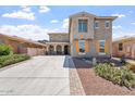 Charming two-story home with desert landscaping and long driveway, perfect for Gathering living at 10417 W Alyssa Ln, Peoria, AZ 85383