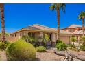 Inviting single-Gathering home with beautiful desert landscaping and a well-maintained exterior at 15471 W Post Cir, Surprise, AZ 85374