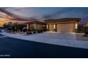 Well-maintained home with desert landscaping and a three car garage at 18126 W Ocotillo Ave, Goodyear, AZ 85338