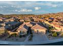 Lovely home with a three car garage, desert landscaping and mountain views at 18126 W Ocotillo Ave, Goodyear, AZ 85338