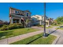 This lovely home features a lush green lawn and beautiful landscaping at 3828 E Pinto Dr, Gilbert, AZ 85296