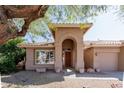 Inviting entrance with a wooden front door and an arched entryway at 5185 W Del Rio St, Chandler, AZ 85226