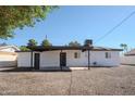 Home with a covered patio, gravel landscaping, and a classic exterior paint scheme at 6130 N 27Th Ave, Phoenix, AZ 85017