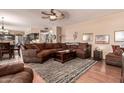 Spacious living room featuring comfortable sectional seating and stylish decor at 7103 E Medina Ave, Mesa, AZ 85209