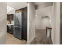 Modern kitchen featuring stainless steel appliances and wood-look flooring at 7129 E Broadway Rd # 72, Mesa, AZ 85208