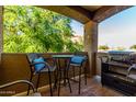 Cozy patio featuring comfortable seating and a grill, perfect for outdoor entertaining at 10136 E Southern Ave # 2064, Mesa, AZ 85209