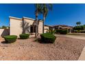 Single-story home featuring desert landscaping and mature landscaping at 1865 S Morrison Ln, Gilbert, AZ 85295