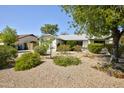 Beautiful single-story house with a well-kept yard of desert landscaping and healthy green shrubbery at 3106 W Mohawk Ln, Phoenix, AZ 85027