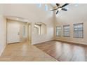 Bright living room featuring arched doorways, high ceilings, and natural light at 3370 E Flamingo Ct, Gilbert, AZ 85297