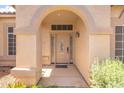Welcoming front entrance featuring an arched entryway and ornate glass front door at 530 N Jesse Ct, Chandler, AZ 85225