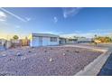 Nice single-story home showcasing the low maintenance desert landscaping at 7318 E Arbor Ave, Mesa, AZ 85208