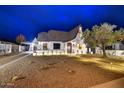 Charming home with a well-maintained front yard, pathway lighting, and inviting curb appeal at 87 W Windsor Ave, Phoenix, AZ 85003