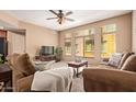 Bright and cozy living room featuring neutral paint, plush seating, and plenty of natural light at 900 S 94Th St # 1166, Chandler, AZ 85224