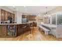 Bright kitchen with island seating and a breakfast nook for dining at 9566 E Raindance Trl, Scottsdale, AZ 85262