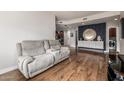 Inviting living room with wood floors, modern accents and an open layout at 5350 E Deer Valley Dr # 4267, Phoenix, AZ 85054
