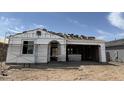 New home under construction with an attached garage, ready for the finishing touches at 7603 W Avenida Del Rey --, Peoria, AZ 85383