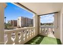 Open balcony with views of community buildings and pool at 7920 E Camelback Rd # 303, Scottsdale, AZ 85251