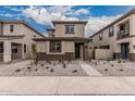 Charming home with stone accents and a low-maintenance gravel front yard in a neighborhood setting at 15587 S 180Th Ln, Goodyear, AZ 85338