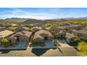 Expansive single-story home nestled in a desert community with scenic mountain views at 29188 N 70Th Ave, Peoria, AZ 85383
