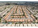 Expansive aerial shot of a sprawling residential community with private pools at 4529 E Thistle Landing Dr, Phoenix, AZ 85044