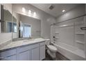 Bathroom featuring white vanity with granite countertop and a shower-tub combination at 2557 E Music Mountain Ave, Apache Junction, AZ 85119