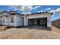 New home being built with a two-car garage, ready for customization at 18271 W La Senda Dr, Surprise, AZ 85387