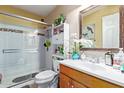 Bathroom with a glass shower door, and a wooden vanity at 3411 W Redfield Rd, Phoenix, AZ 85053