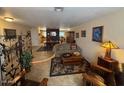 Inviting living room boasting comfortable seating, stylish decor, and seamless flow into the dining area, perfect for entertaining guests at 12601 N 34Th St, Phoenix, AZ 85032