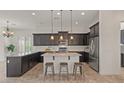 Bright eat-in kitchen featuring granite counters and stainless steel appliances at 2145 N 88Th St, Mesa, AZ 85207