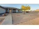 Lovely home showcasing a well-manicured front yard at 22626 W Gibson Ln, Buckeye, AZ 85326