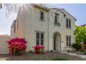 Charming two-story home with a well-maintained yard and beautiful front door at 28967 N 124Th Ave, Peoria, AZ 85383